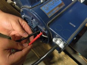 While the motor is running, use a voltmeter to determine if line voltage getting to the motor is the same as indicated leaving the breaker box.